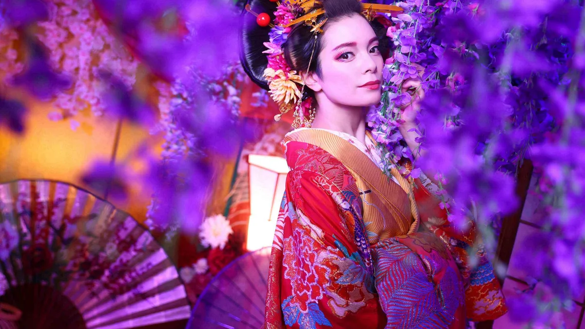 Guest in an oiran-style kimono photographed in a private Asakusa studio during a Tokyo photoshoot